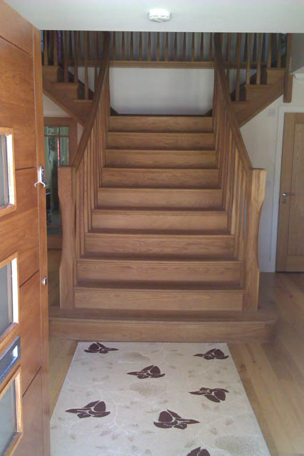 A photograph of an Applewood Joinery Ltd Spindle and mitred staircase.