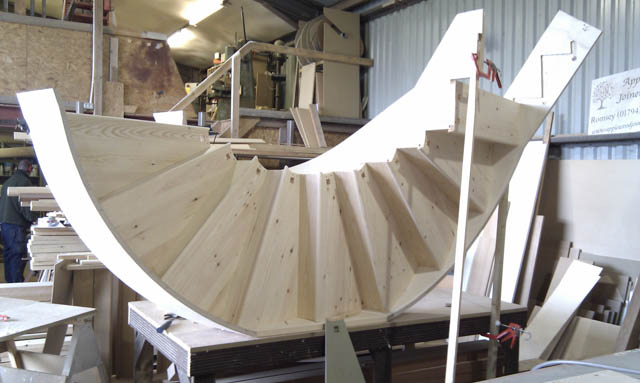 A photograph of an Applewood Joinery Ltd Swept/helical staircase.