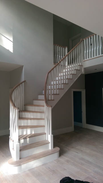 A photograph of an Applewood Joinery Ltd Swept/helical staircase.
